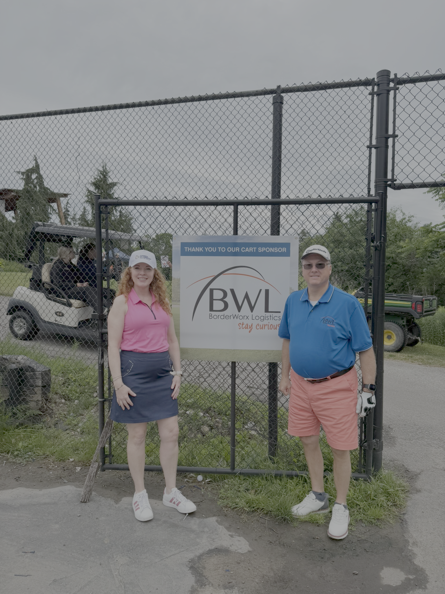 BorderWorx CEO Dean Wood at the cart sponsor sign at the Halton Hills Chamber Golf Classic